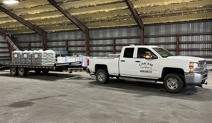 CanAm Professional Landscaping - company truck hauling materials to project site - Girard, IL